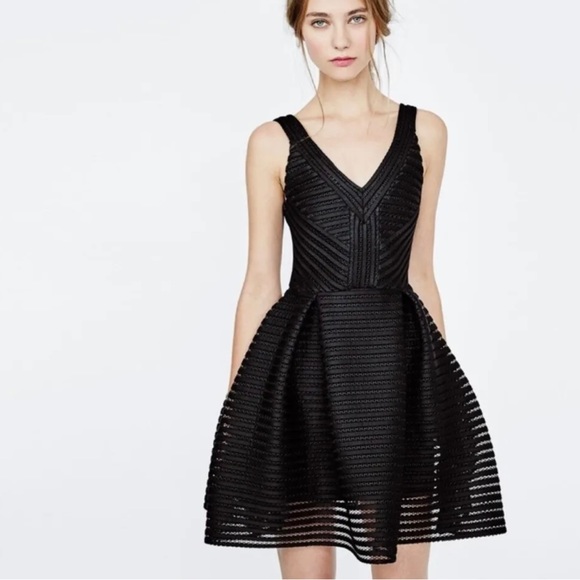 Maje Dresses & Skirts - Maje Black Peplum Cocktail Dress Size 2- near perfect condition!